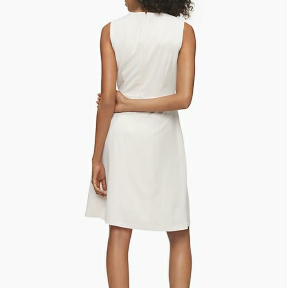 Solid Sleeveless Cascading Ruffle Dress - Picture 3 of 10